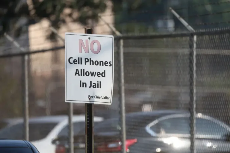 An FCC ruling has cut prison phone bills in half, disrupting the correctional telecommunications industry