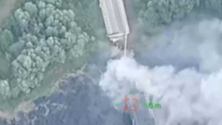 Video appears to show Ukrainian strike on key Russian bridge, which Moscow says was likely carried out using US-made HIMARS rockets