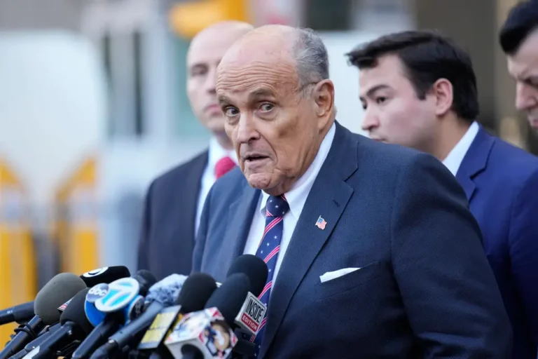 Giuliani says he can’t surrender a Joe DiMaggio jersey in $148M defamation case because it’s locked up in Ronkonkoma, NY