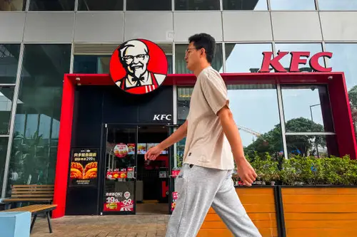 China’s KFC and Pizza Hut CEO said she spends hours watching her customers eat