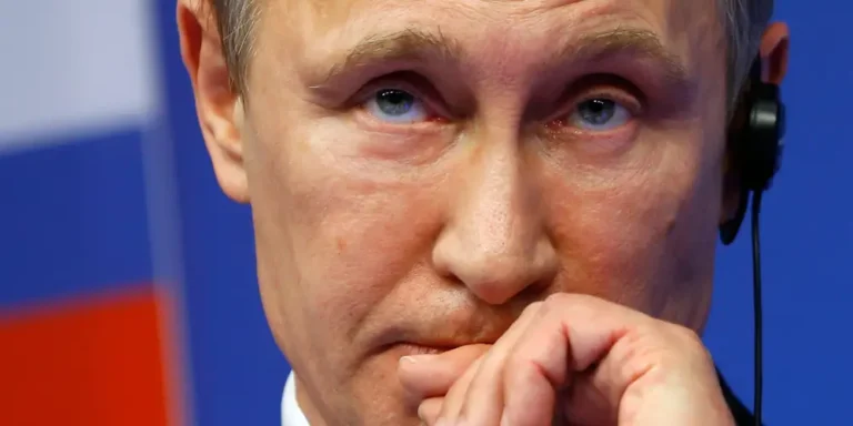 Putin tells Russians there’s no reason to panic as the ruble sinks, but analysts say its economy is in trouble