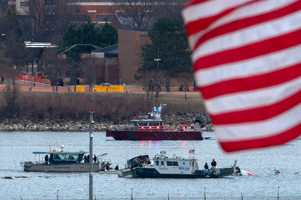 Investigators recovered black boxes from the American Airlines plane