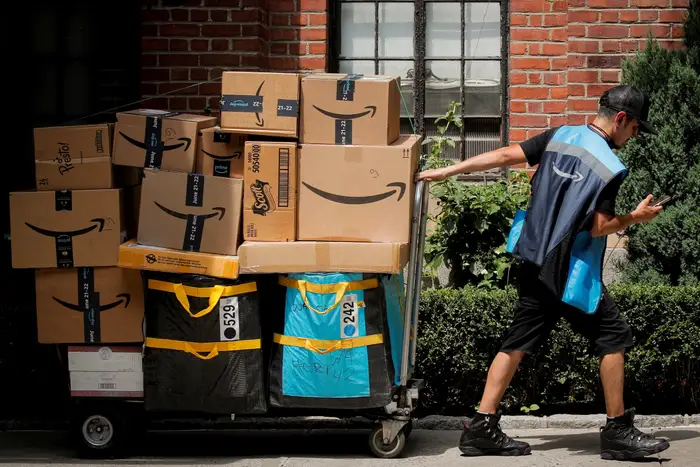 Amazon’s CEO sees evidence of people stockpiling — and says that sellers will likely pass tariff costs onto shoppers