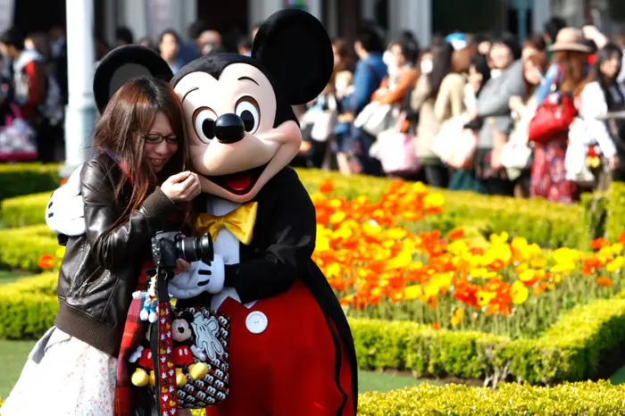 Conservatives say Disney’s become too ‘woke.’ The company’s most passionate fans aren’t buying it.