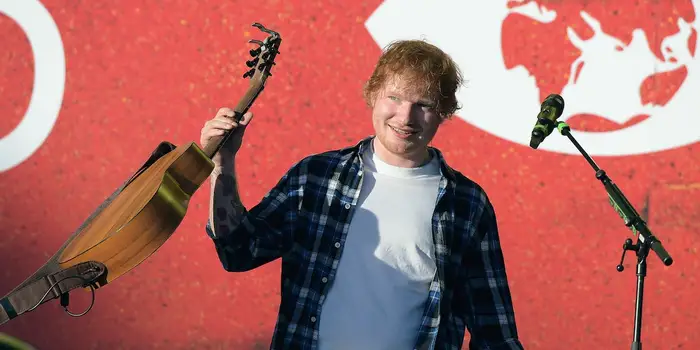 Ed Sheeran says he collects movie props — and would spend 6 figures to get George Clooney’s Batman suit