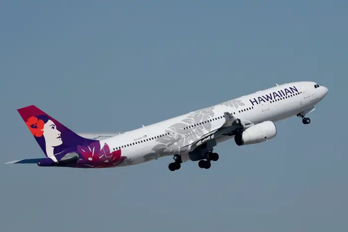 A Hawaiian Airlines flight declared an emergency after a passenger’s phone got stuck in a seat and produced an ‘electrical smell’