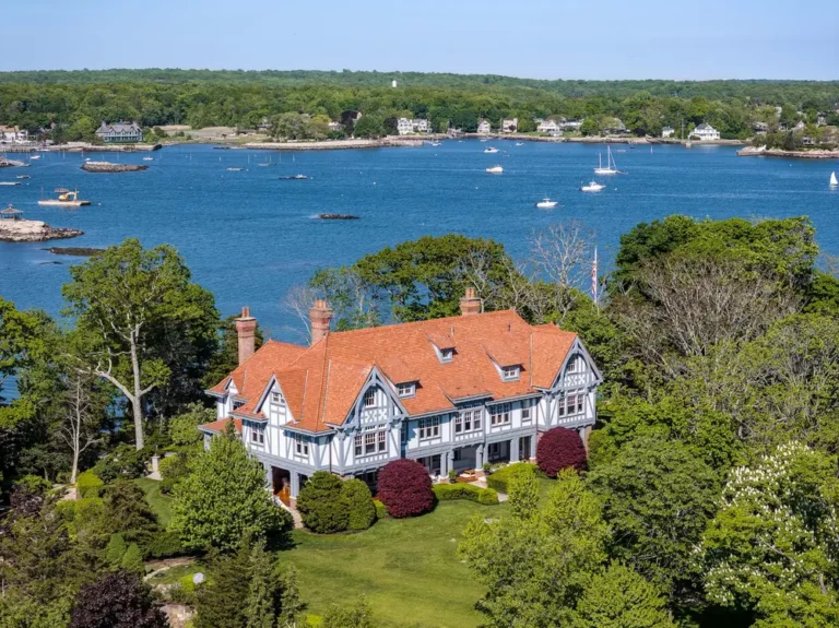 A Bridgewater exec is still trying to sell his private island. He cut its price — and threw in a mainland house with a dock.