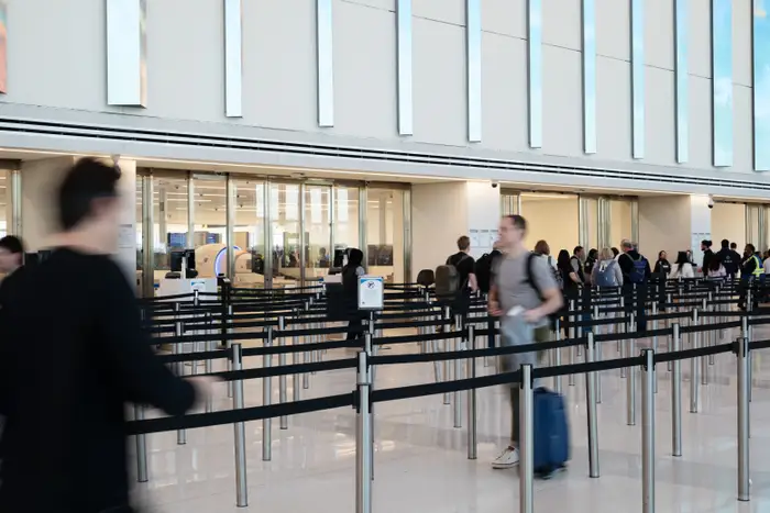 We visited 2 of the busiest US airports on the first day of Real ID requirements. Here’s what our reporters saw.