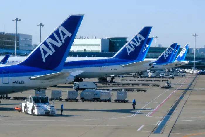 A flight from Tokyo was forced to divert to Seattle after an ‘unruly’ passenger tried to open the exit doors