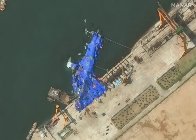 Satellite images show the catastrophic damage to North Korea’s new destroyer that’s lying on its side